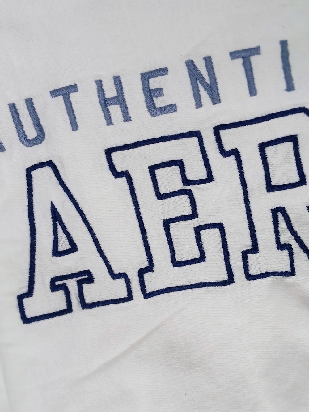 White Tee with Navy Embroidered Lettering